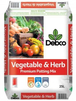 A 25L bag of Debco Premium Vegetable & Herb Soil Mix features vibrant images of vegetables and herbs on the packaging. It promotes premium qualities like fertilizers, wetting agents, and calcium to ensure healthy plant growth.