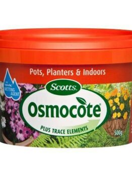 A tub of Osmocote Controlled Release Fertiliser: Pots, Planters & Indoors 500g, perfect for use in pots, planters, and indoors. The packaging is predominantly red with vibrant images of flowers.