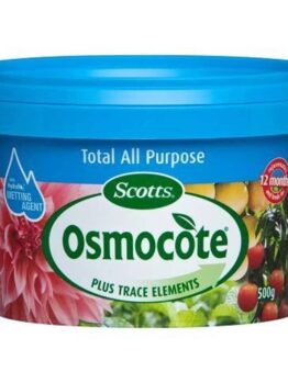 A blue container of Osmocote Controlled Release Fertiliser: Fruit, Citrus, Trees & Shrubs 500g with images of flowers and fruits on the label. Perfect for Fruit Citrus Trees and Shrubs, it includes a hydraulic wetting agent and provides 12 months of nourishment.