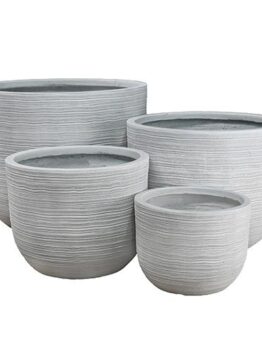 A set of our grey coloured decorative pots for feature plants rippled texture different sizes