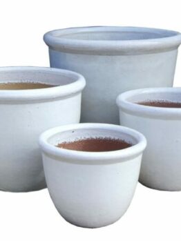 Four white ceramic pots decorative for gardens and plants