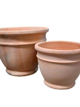 Two terracotta pots on a white background. feature pots for decorative plants orange terracotta planter pots