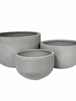 A collection of UrbanCrete Deep Bowl Cement S 70x61cm planters.
