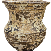 The Sorrento 'Azzur Urn' Antique M 56x56cm features a wide brim and bulbous body with textured, weathered surfaces reminiscent of ancient treasures.