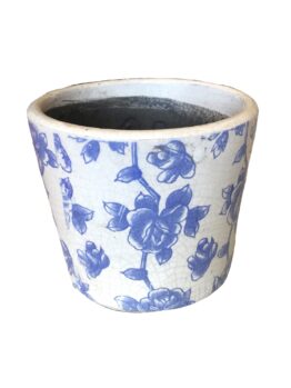 White ceramic pot with blue floral patterns on the surface.