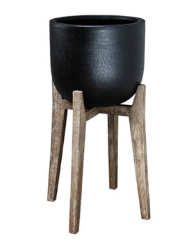 Black pot on a wooden stand with four angled legs.