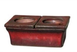 A rectangular red ceramic African Violet Dual Self-Watering Planter (18x12x7cm) with two side-by-side circular openings on top, shown against a white background.