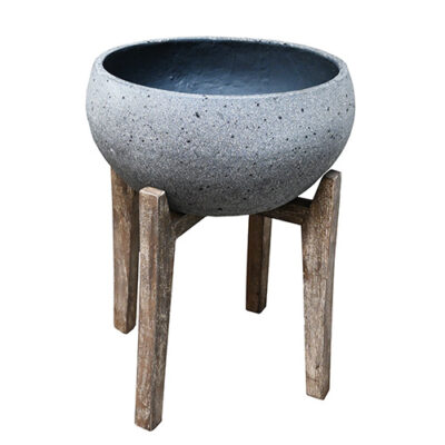The UrbanStyle Bowl with Legs Cement S 40x42cm (Copy), a round grey planter on three wooden legs, is pictured against a white background.