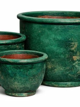 Three green ceramic flower pots of varying sizes are arranged together on a white background.