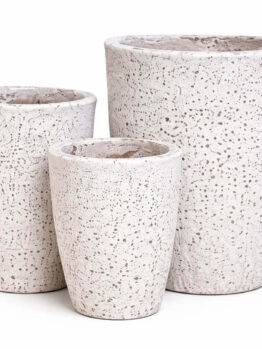 Three white, textured cylindrical planters of varying heights are arranged closely together on a white background.