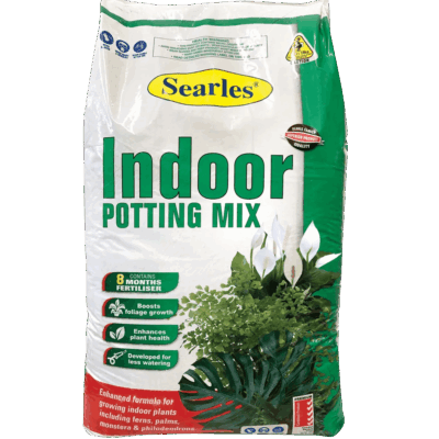 A bag of Searles® Indoor Potting Mix 10L displays indoor plants and highlights benefits such as six months of fertiliser, water efficiency, and a Soil Improver Mix Compost Blend for healthier plant growth.