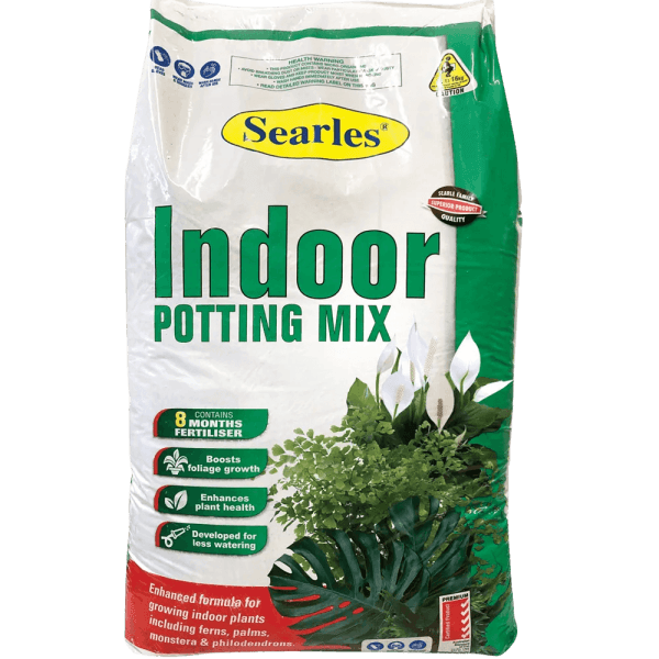 A bag of Searles® Indoor Potting Mix 10L displays indoor plants and highlights benefits such as six months of fertiliser, water efficiency, and a Soil Improver Mix Compost Blend for healthier plant growth.