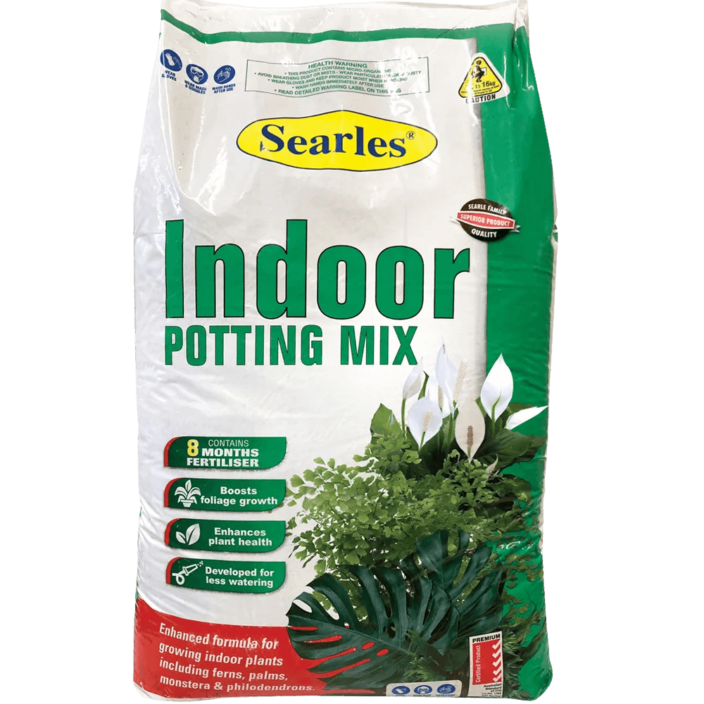 A bag of Searles® Indoor Potting Mix 10L displays indoor plants and highlights benefits such as six months of fertiliser, water efficiency, and a Soil Improver Mix Compost Blend for healthier plant growth.